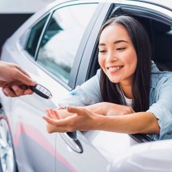 happy-woman-car-dealership